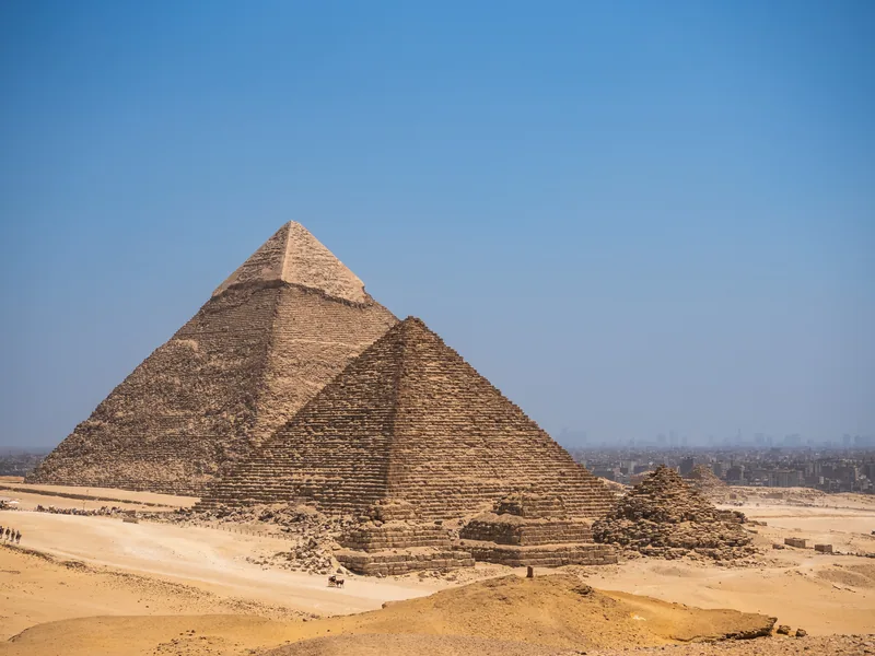 The Pyramids of Khafre and Khufu with smaller queens' pyramids at their base.