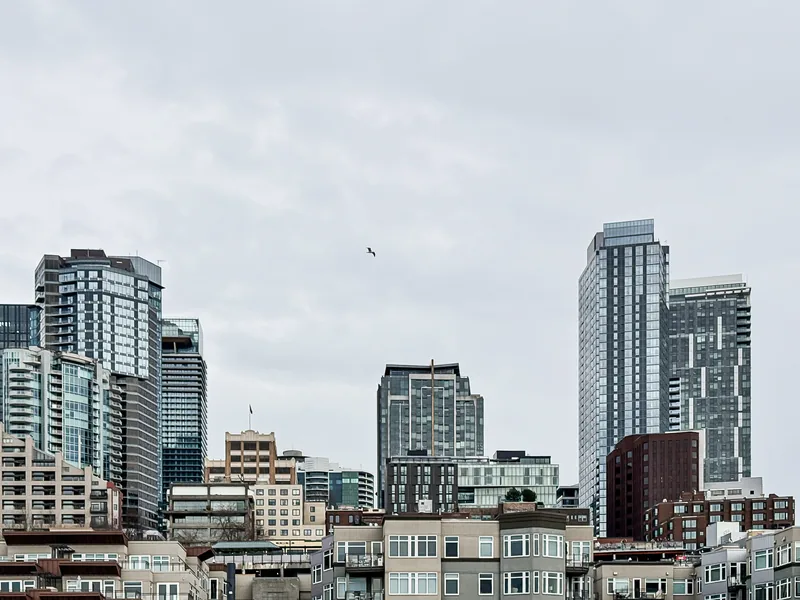 Downtown Seattle towers under an overcast sky.